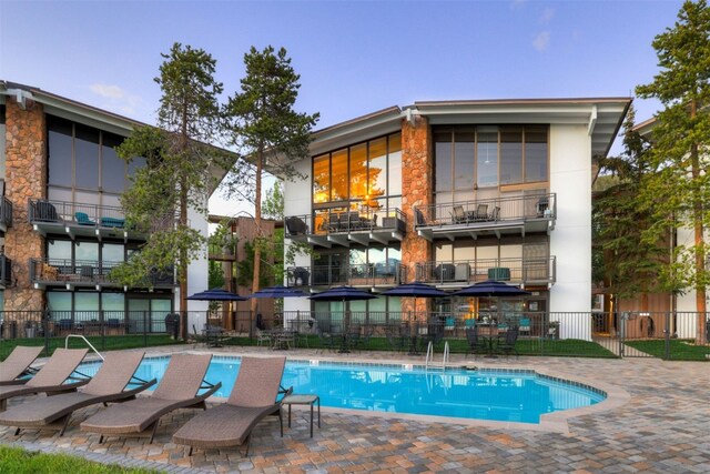 view of pool featuring a patio area