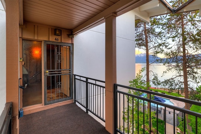 view of balcony at dusk