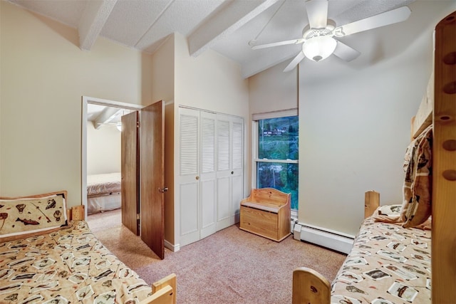 carpeted bedroom featuring ceiling fan, lofted ceiling with beams, baseboard heating, and a closet