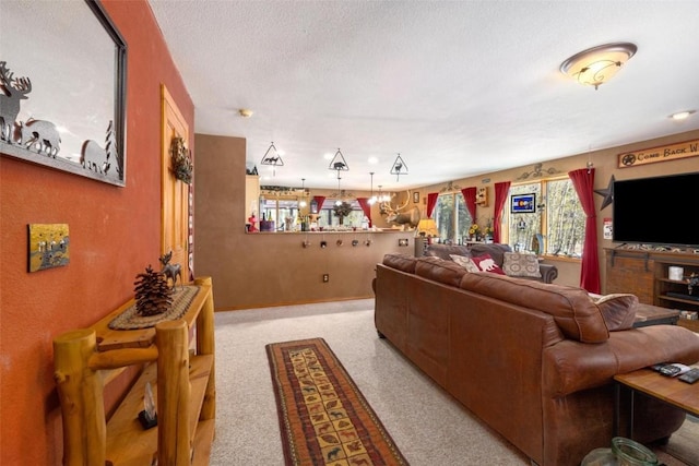 living room featuring a textured ceiling