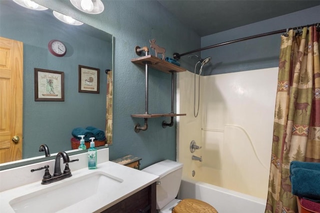 full bathroom featuring shower / bath combo, toilet, and vanity