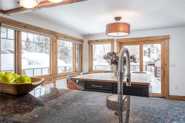 sunroom with plenty of natural light