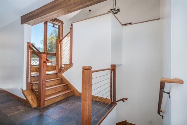 stairs with lofted ceiling