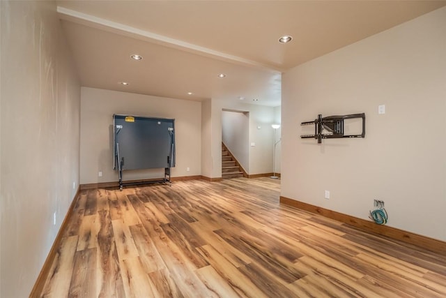 unfurnished living room featuring light hardwood / wood-style flooring