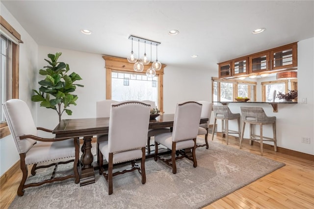 dining space featuring a chandelier and hardwood / wood-style floors