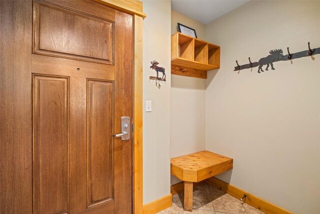 washroom featuring washing machine and dryer and cabinets