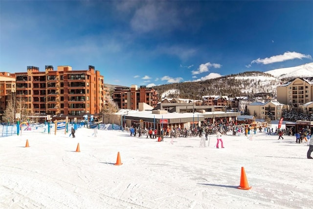 view of community with a mountain view