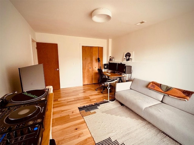 living room with hardwood / wood-style flooring