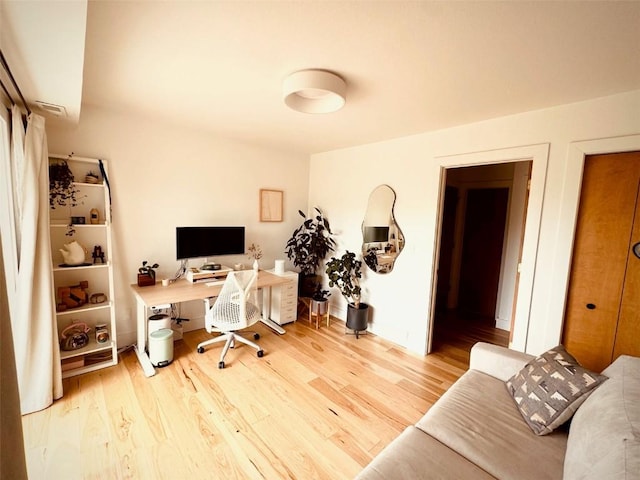 office area with light wood-type flooring