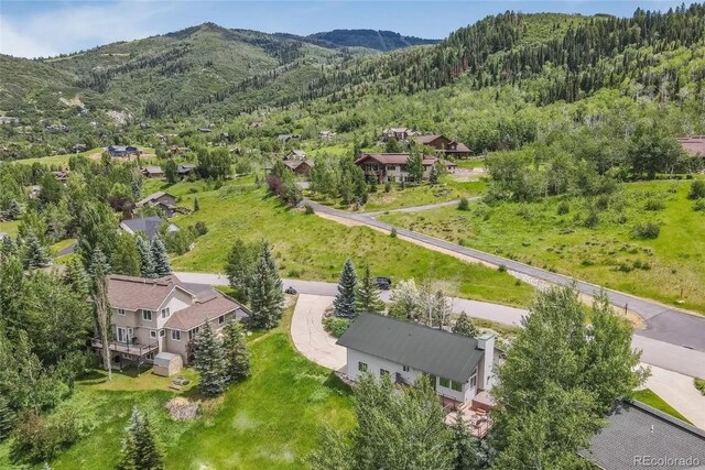 drone / aerial view featuring a mountain view