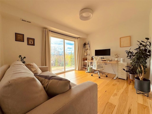 home office with light wood-type flooring