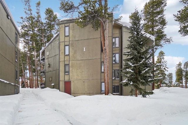 view of snow covered property