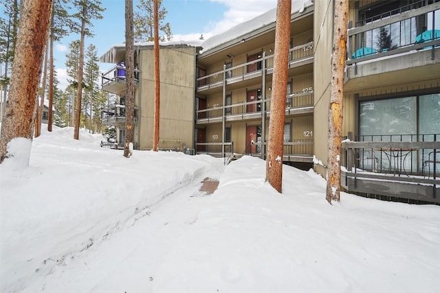 view of snow covered property