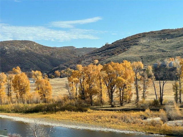 property view of mountains featuring a water view