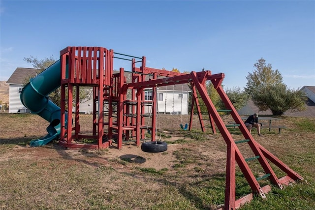 view of playground with a yard