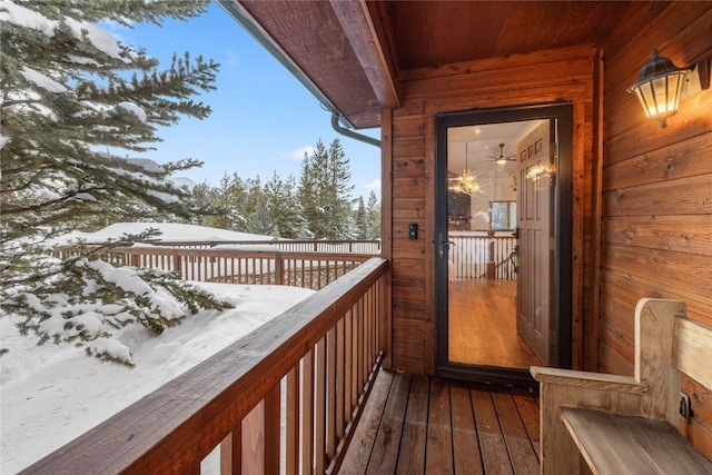 view of snow covered deck