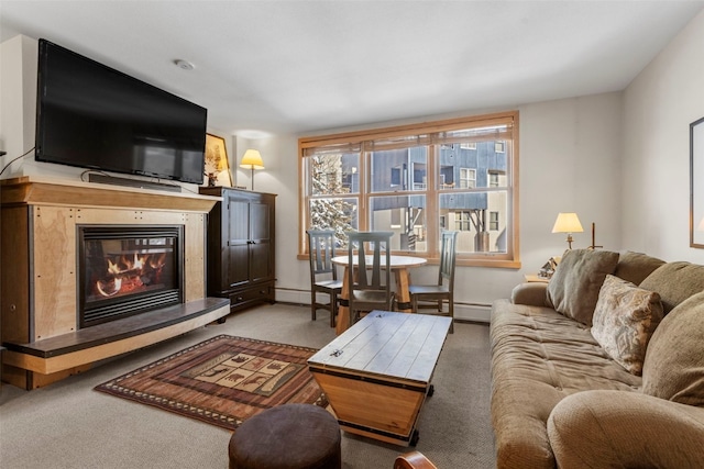 living room with carpet flooring and a baseboard heating unit