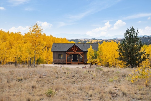 rear view of house with a mountain view