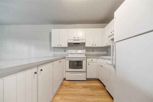 kitchen featuring white cabinets, white appliances, and light hardwood / wood-style flooring