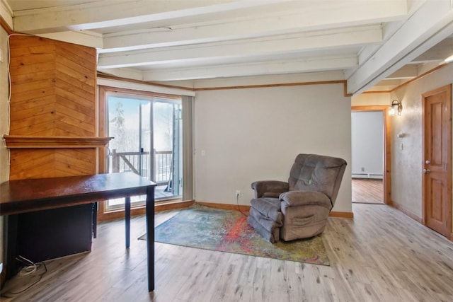 home office with beamed ceiling, light wood-type flooring, and a baseboard radiator