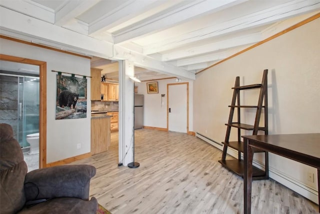 living room with lofted ceiling with beams, light wood-type flooring, and a baseboard radiator