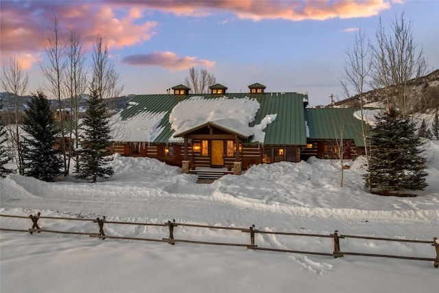 view of log cabin