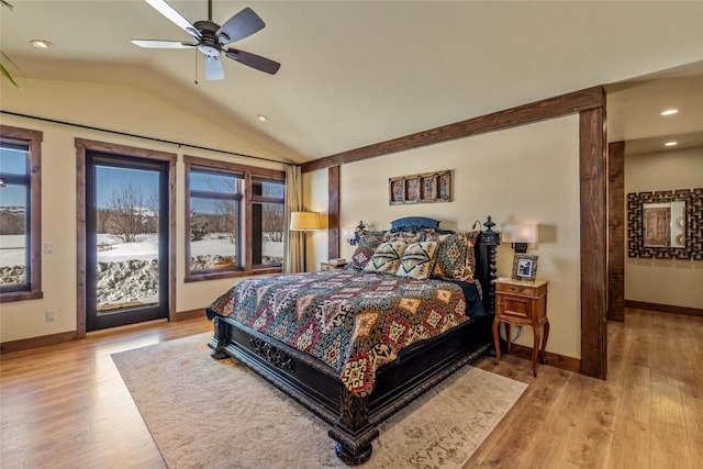 bedroom featuring light wood-type flooring, ceiling fan, vaulted ceiling, and access to outside