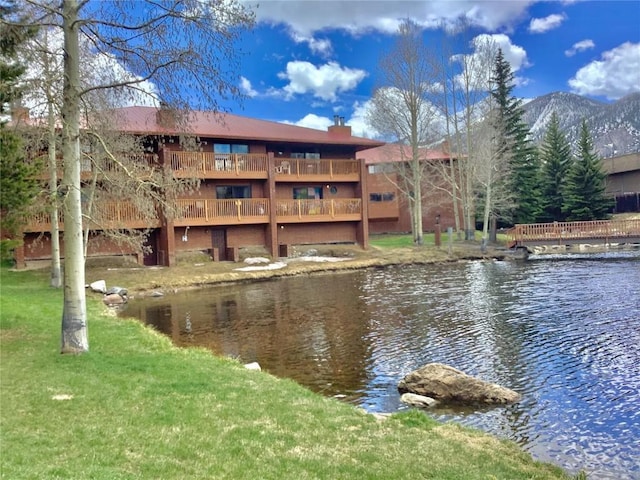 property view of water featuring a mountain view