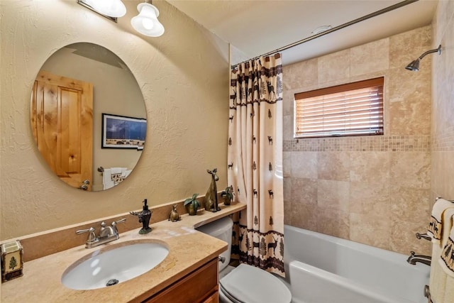 full bathroom with shower / bath combo with shower curtain, vanity, and toilet