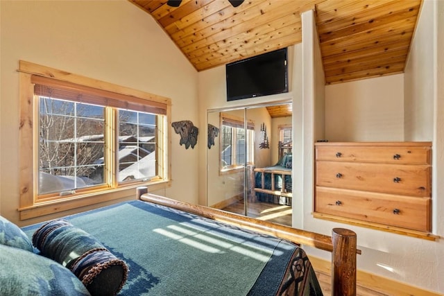 bedroom featuring high vaulted ceiling, a closet, wooden ceiling, and ceiling fan