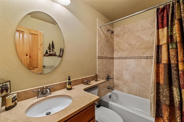 full bathroom featuring vanity, shower / bath combo, and toilet