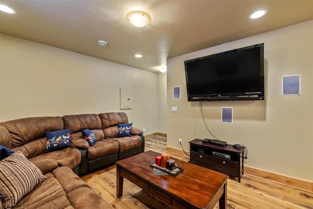 living room with light hardwood / wood-style flooring