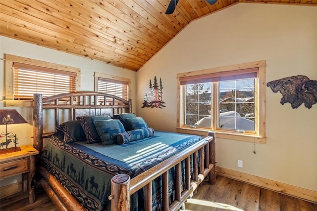 bedroom featuring multiple windows, ceiling fan, wood ceiling, and hardwood / wood-style flooring