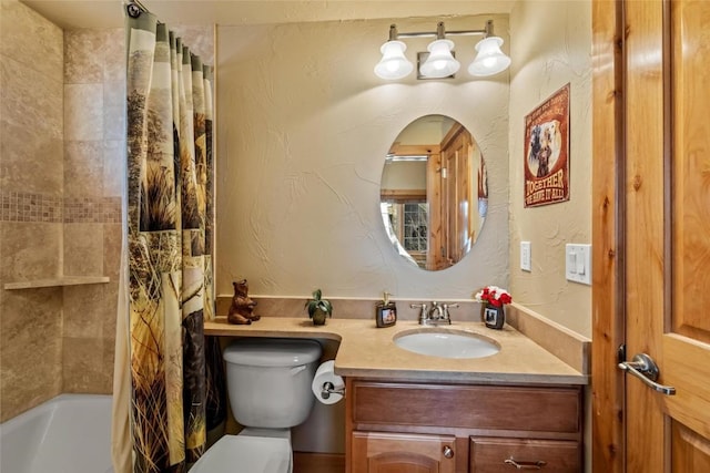 full bathroom featuring shower / bath combination with curtain, toilet, and vanity