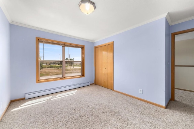 interior space featuring baseboard heating, light carpet, and a closet