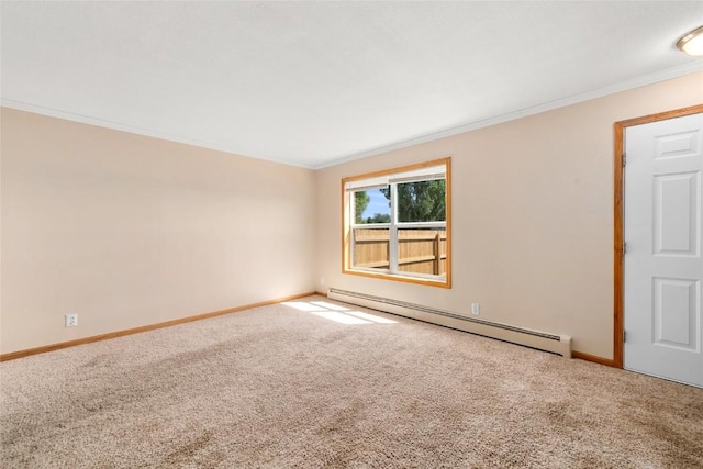 empty room with carpet, a baseboard radiator, and crown molding