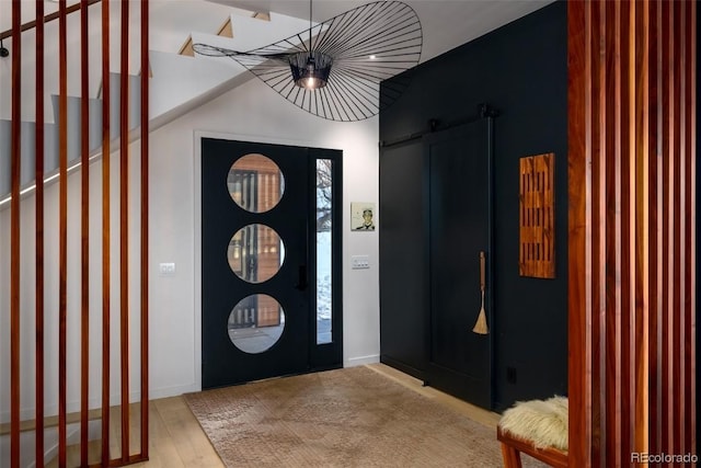 foyer entrance with light wood-type flooring