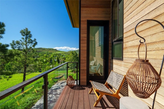 balcony featuring a mountain view