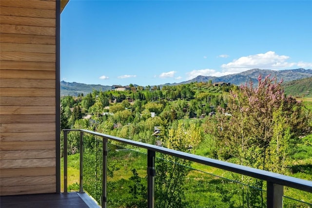 balcony featuring a mountain view