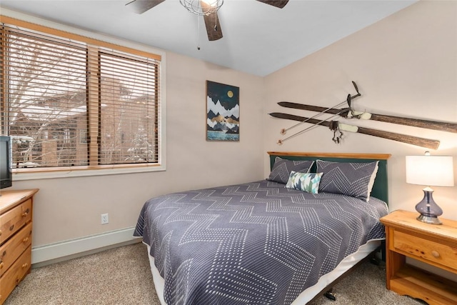 bedroom with ceiling fan and carpet floors