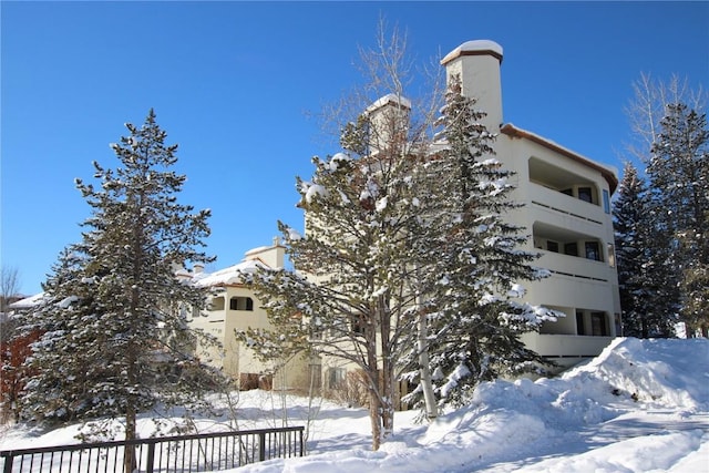 view of snow covered building