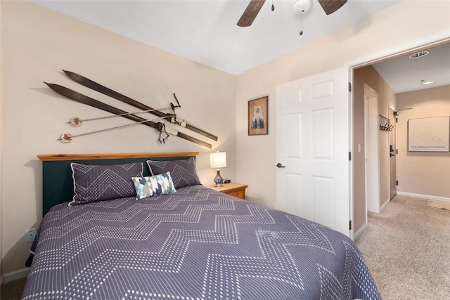 carpeted bedroom featuring ceiling fan