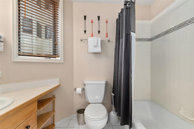 full bathroom with toilet, vanity, tile patterned floors, and shower / bath combo with shower curtain