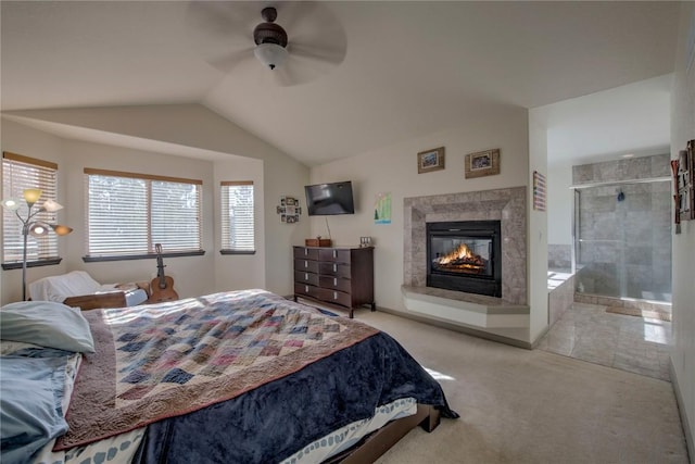 bedroom with lofted ceiling, ceiling fan, and light carpet