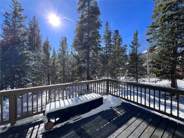 view of snow covered deck