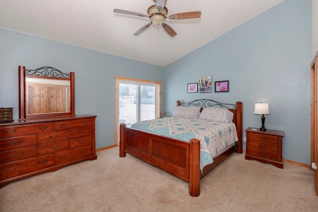 carpeted bedroom with ceiling fan and lofted ceiling