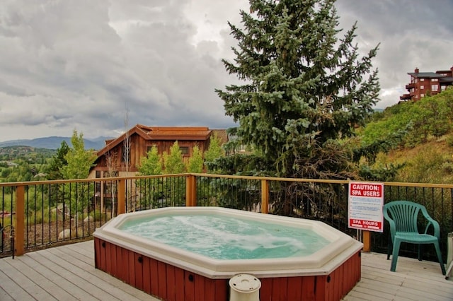 wooden terrace with a mountain view