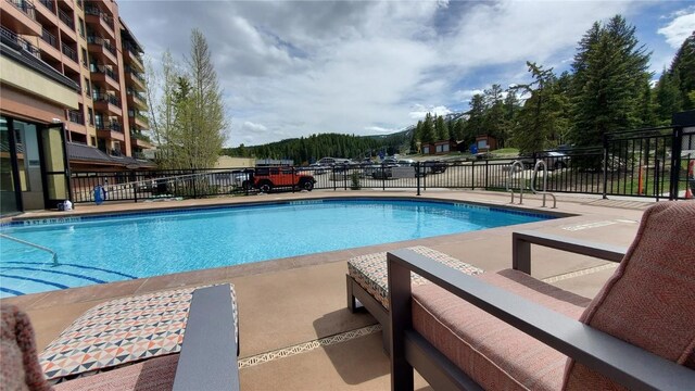 view of pool with a patio area