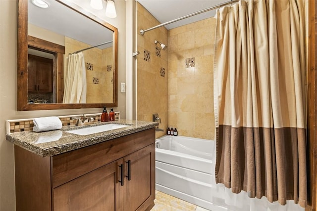 bathroom with shower / bath combo and vanity