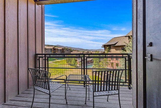 balcony featuring a mountain view